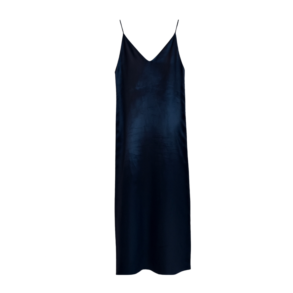 Navy slip dress on a white background